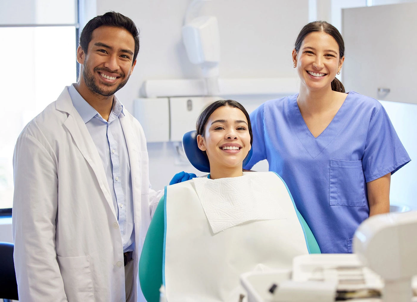 Dental assistant students training hands-on in a real dental practice